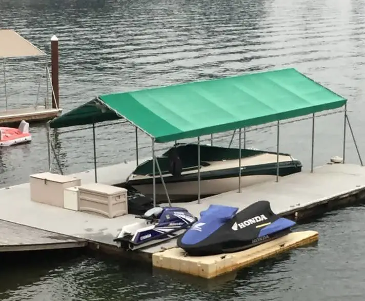 Boat Dock with boat and two jet skis
