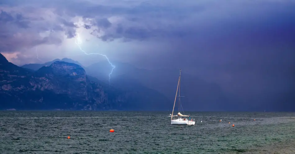 Sailboat with a lightning storm in the background