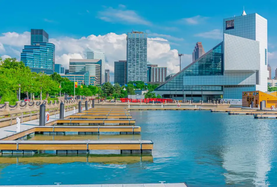 Photo of a boat dock with downtown buildings in the background
